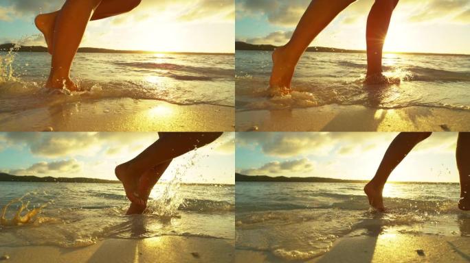 慢动作: 女孩在沙滩上奔跑时溅起玻璃状的海水。