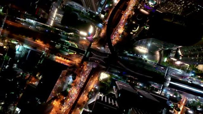 空中拍摄/超拍摄/延时拍摄/无人驾驶飞机-曼谷市、西隆/萨洪中央商务区与夜空塔的拍摄