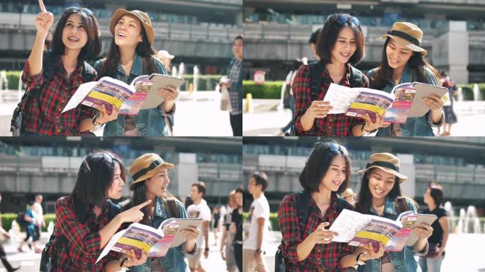 旅游朋友在城市看地图