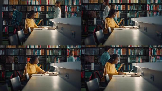 大学图书馆:有天赋的黑人女孩使用笔记本电脑，为论文写笔记，论文，为课堂作业学习。学生们正在为考试而学