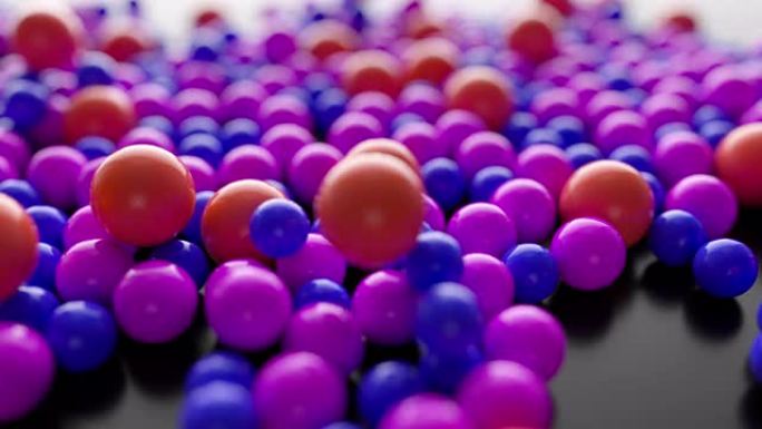 不断增长的一堆抽象的彩色球体和滚珠滚落。4k 3D渲染