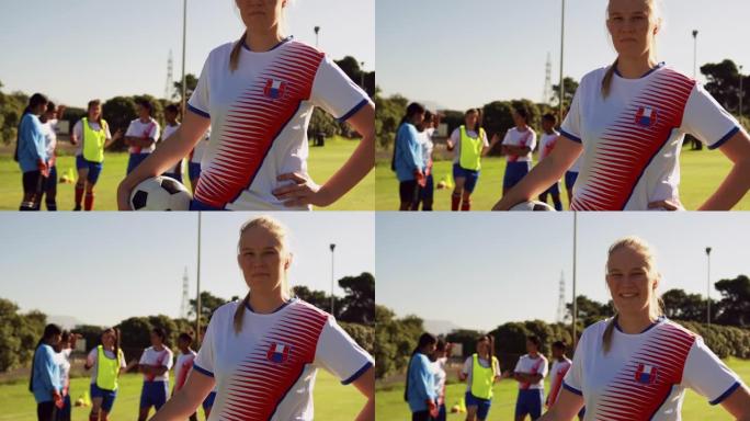 女足球运动员持球，队友在足球场上交谈。4k