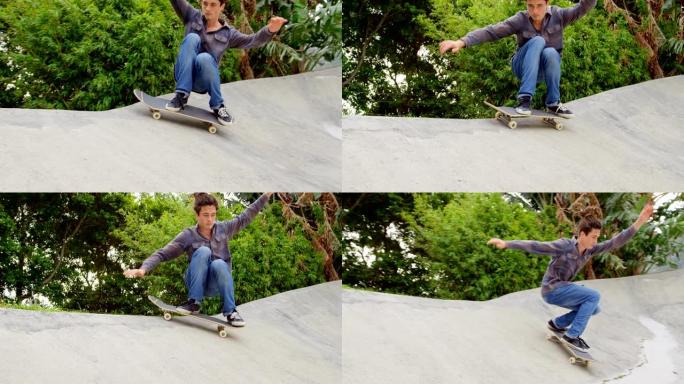 在滑板公园4k的坡道上练习滑板技巧的白人年轻人的前视图