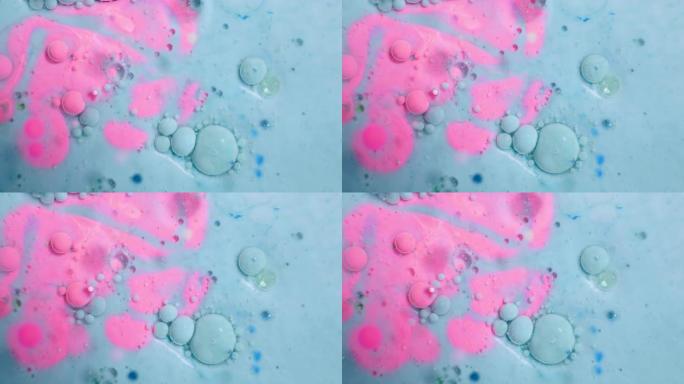 丙烯酸涂料的抽象运动。从上方观看。令人难以置信的混合颜色图案