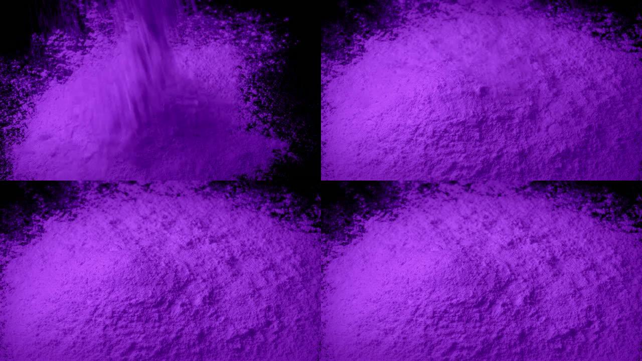 紫色粉末倒入堆中粉末下落粉状物