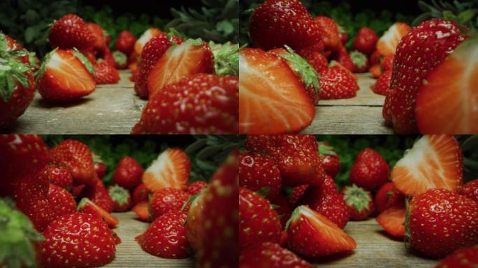 在慢动作的木凳上拍摄strowberries的超级宏观幻灯片。