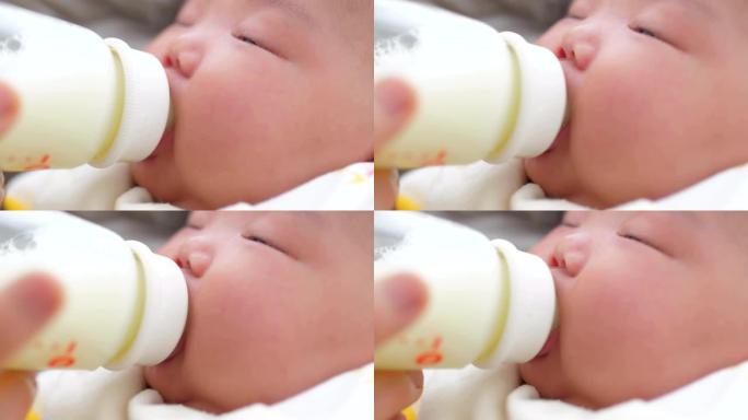 给新生婴儿喂奶