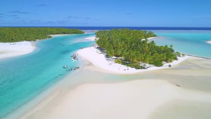 空中: 游客和当地人在太平洋壮观的热带岛屿上聚会。