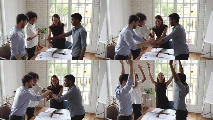 快乐多元化的业务团队将双手放在一起作为团队合作的概念