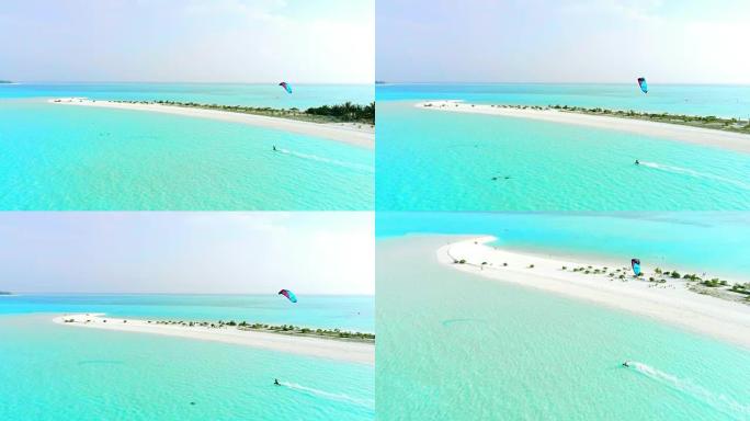 马尔代夫阳光明媚的热带蓝海上的WS鸟瞰图人风筝冲浪