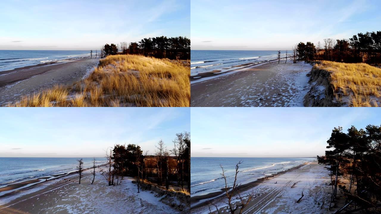 冬季海滩日落。波兰海岸线的鸟瞰图