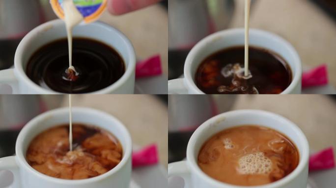 将奶油倒入咖啡中调制咖啡调咖啡倒咖啡伴侣