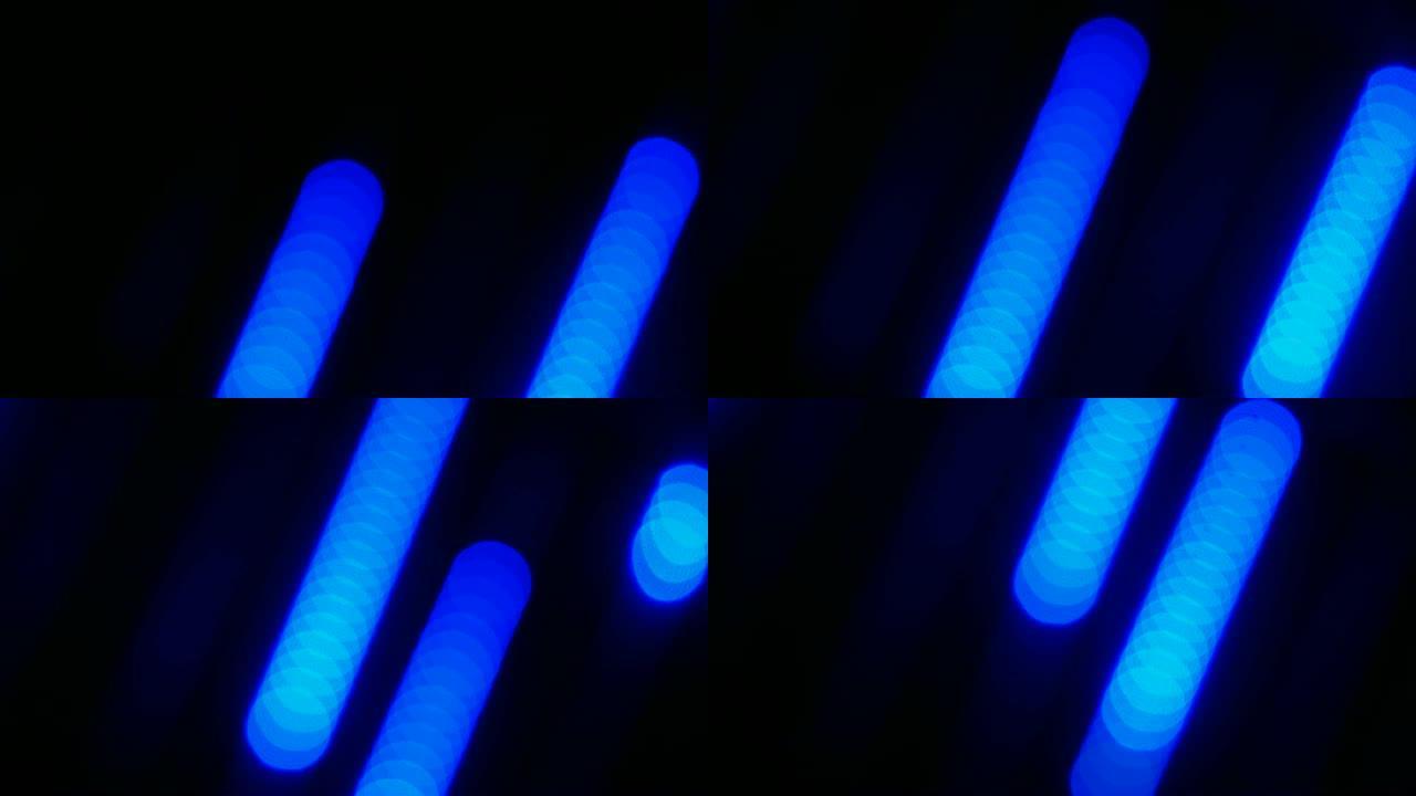 光脉冲和发光。蓝色光线粒子对撞激光