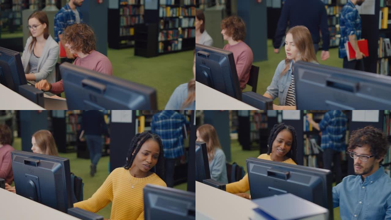 大学图书馆: 一排不同种族的学生在计算机上工作，学习，考试学习，写论文，做研究，完成课堂作业，与同学