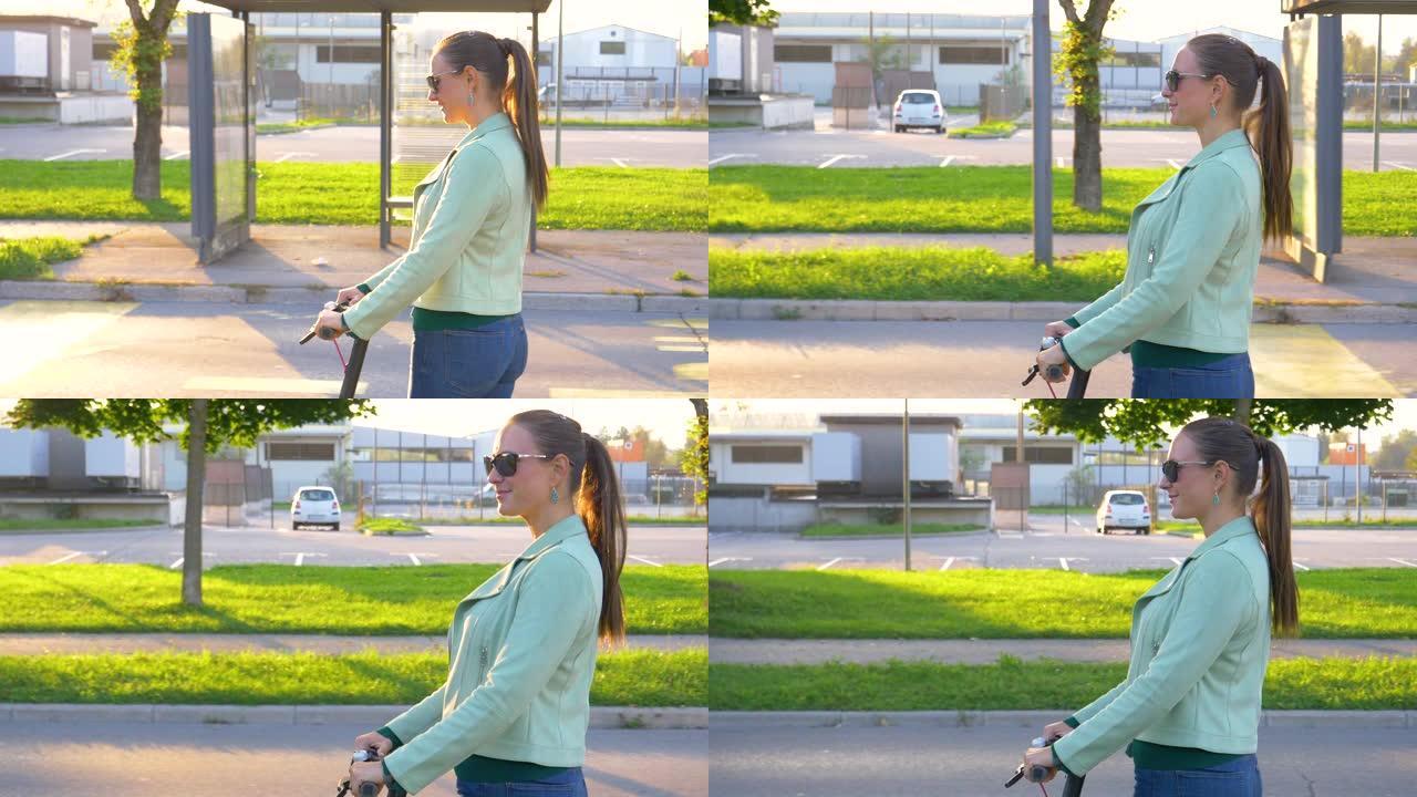特写: 年轻的千禧一代妇女在阳光明媚的日子里骑着一辆凉爽的电动踏板车