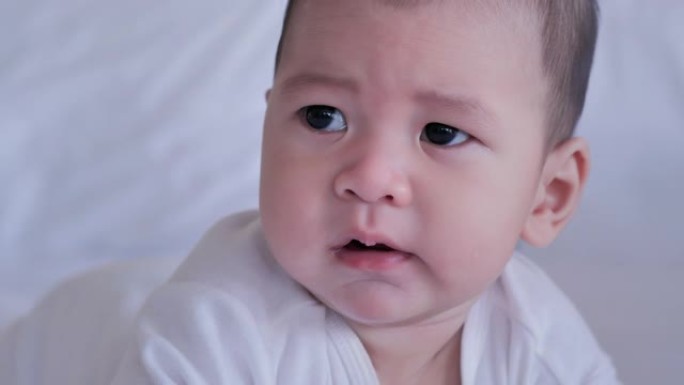 新生儿哭泣男婴的肖像。亚洲家庭，人寿保险，新生，人，情感概念。视频: 多样化的肖像