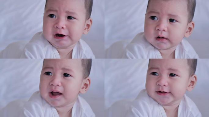 新生儿哭泣男婴的肖像。亚洲家庭，人寿保险，新生，人，情感概念。视频: 多样化的肖像