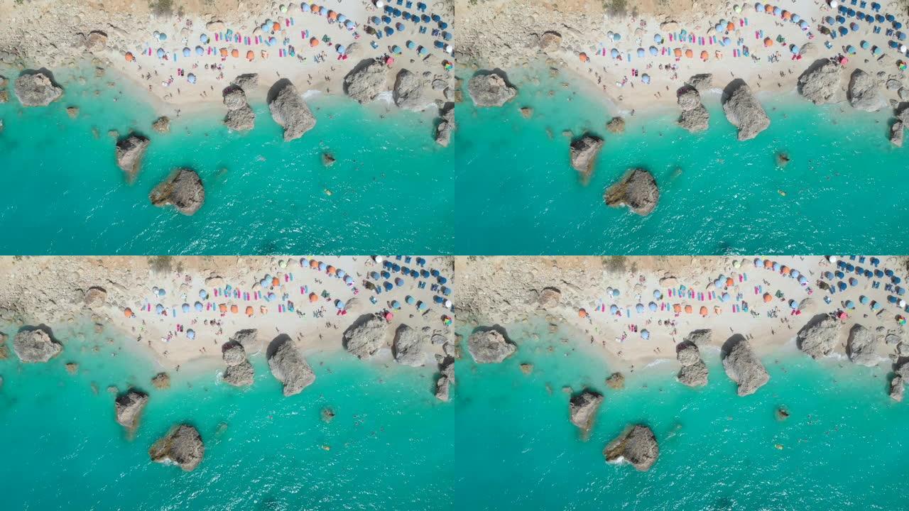 空中: 人们在地中海风景秀丽的isle沙滩上玩乐