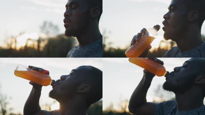 年轻的非洲男运动员的慢动作特写镜头在阳光明媚的田径场训练后正在呼吸