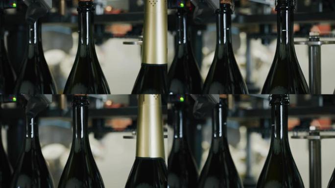 使用自动输送机设备慢动作关闭香槟葡萄酒的生产和装瓶过程。