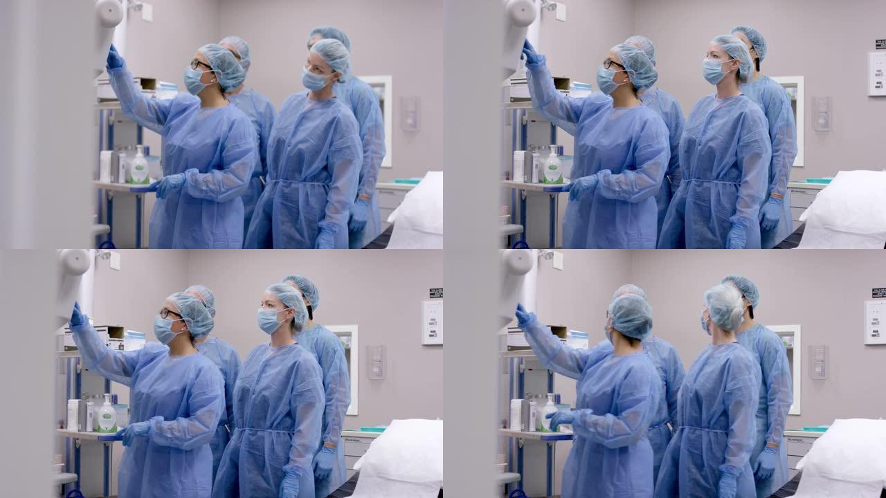 女性外科医生在手术前与手术团队一起检查病人的身体状况