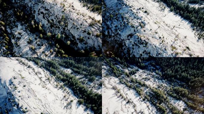 在阳光明媚的优胜美地国家公园，俯视无人机飞越令人难以置信的白山岩石山脊，上面覆盖着松树