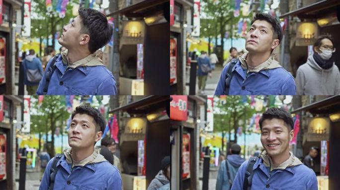 日本帅哥在东京街头四处张望的慢动作视频