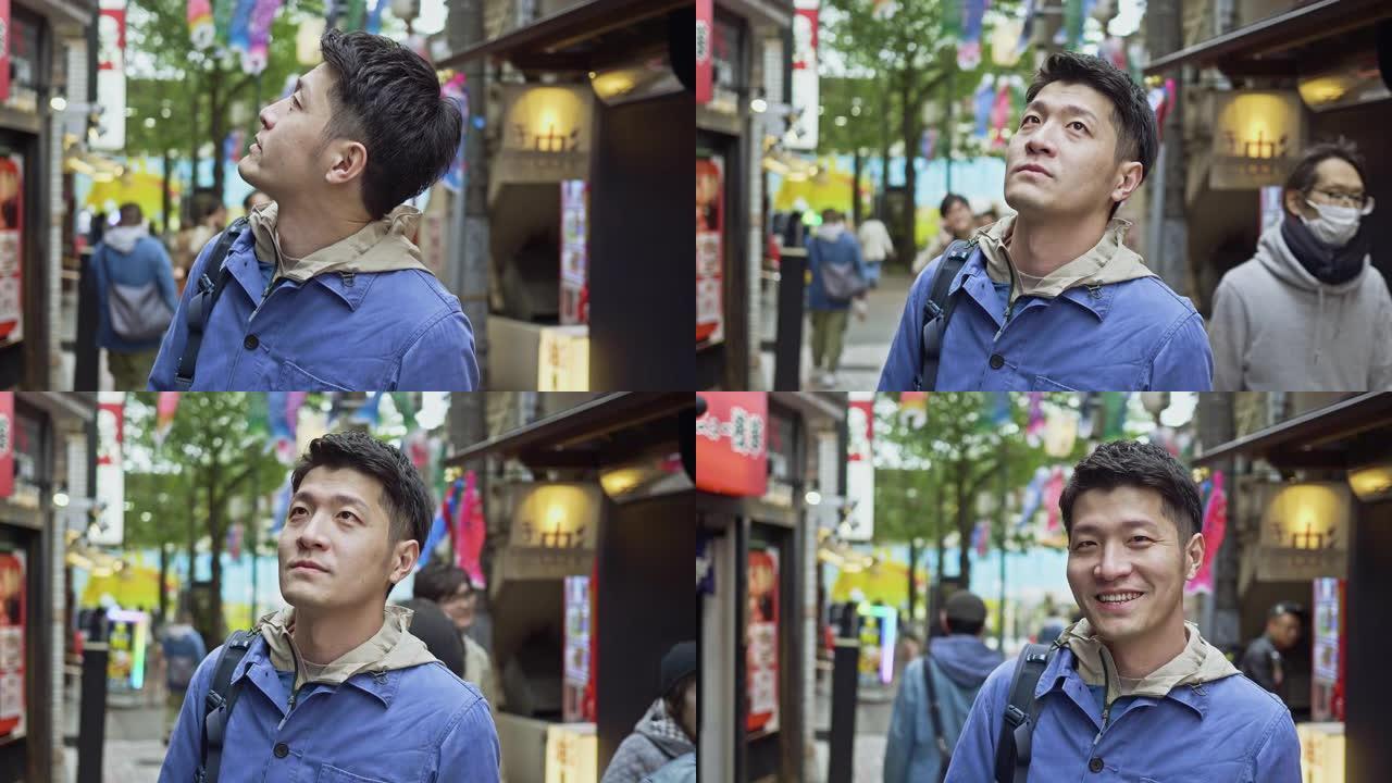日本帅哥在东京街头四处张望的慢动作视频