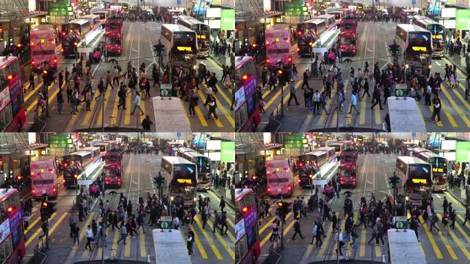 慢动作: 人们在香港铜锣湾的斑马十字架上行走。