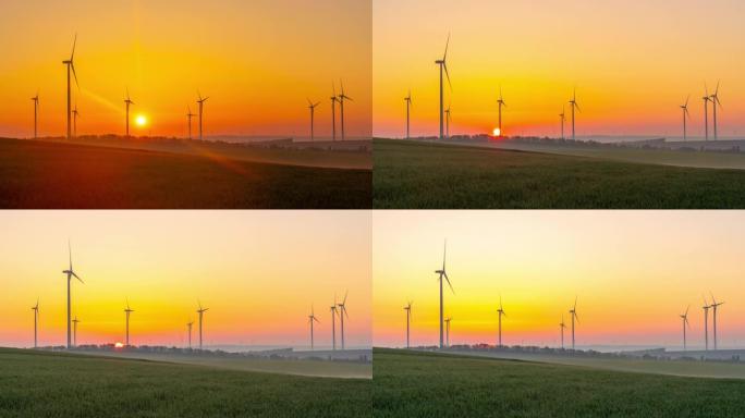 T/L时间翘曲日落在农村旋转的风力涡轮机的延时拍摄