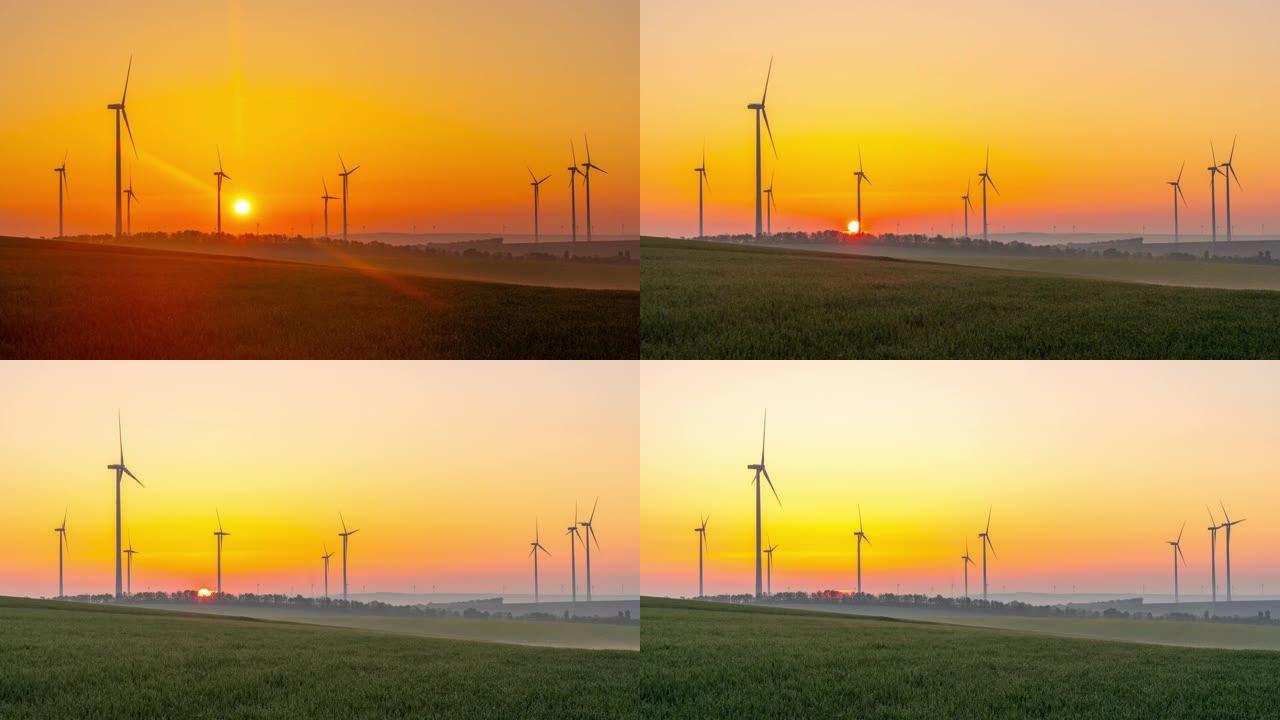 T/L时间翘曲日落在农村旋转的风力涡轮机的延时拍摄
