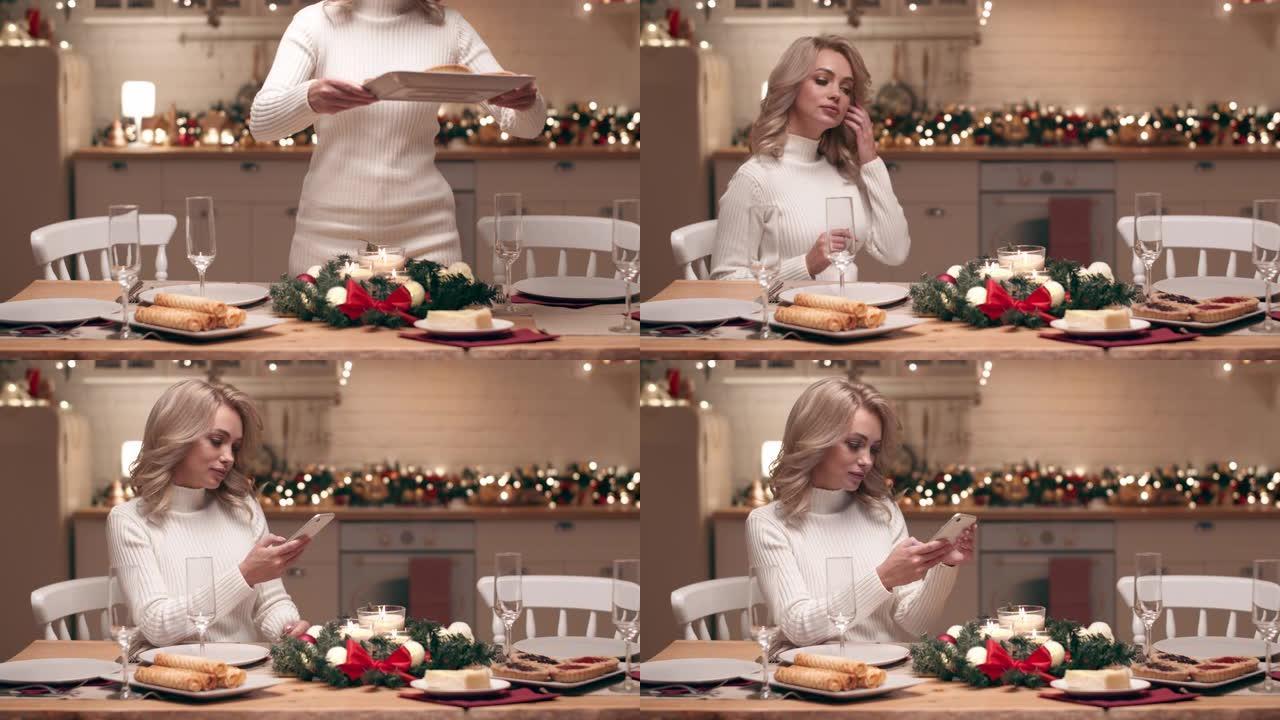 一个漂亮的金发女郎正在为客人的到来准备圣诞晚餐。她在家里的厨房里摆了一张喜庆的桌子。