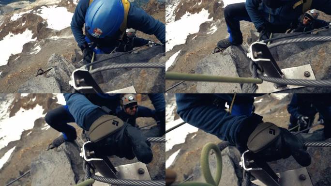 男人正在爬到山顶外国人实拍素材