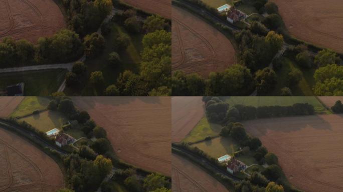 无人驾驶飞机拍摄乡间别墅，游泳池设在农田间