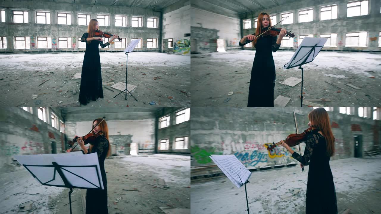 红发女郎正在一座搁浅的建筑里拉小提琴