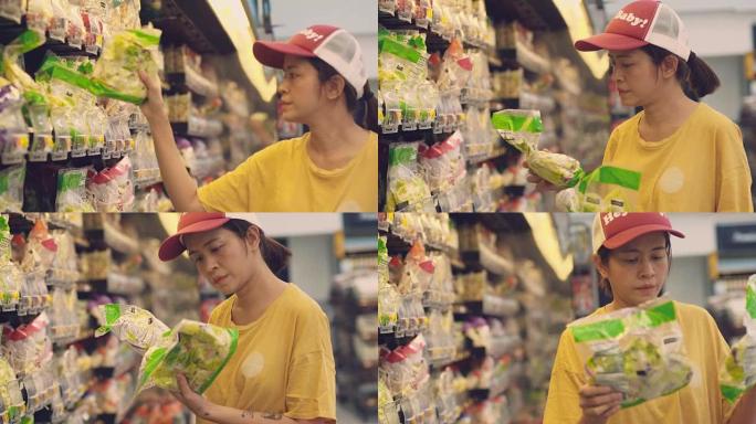 时髦的女人在超市买食物。
