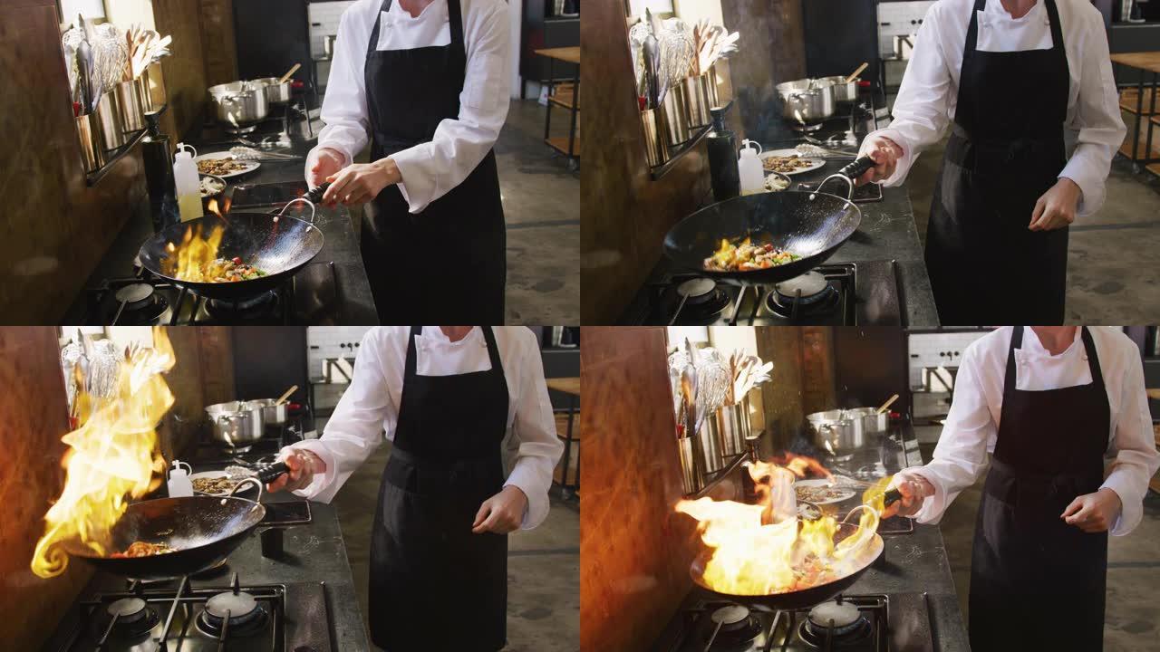 厨师用火烹饪蔬菜翻炒炒锅炒菜