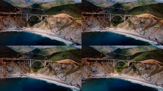 加州大苏尔1号公路夏季景观全景上著名的比克斯比溪桥的史诗电影空中拍摄。