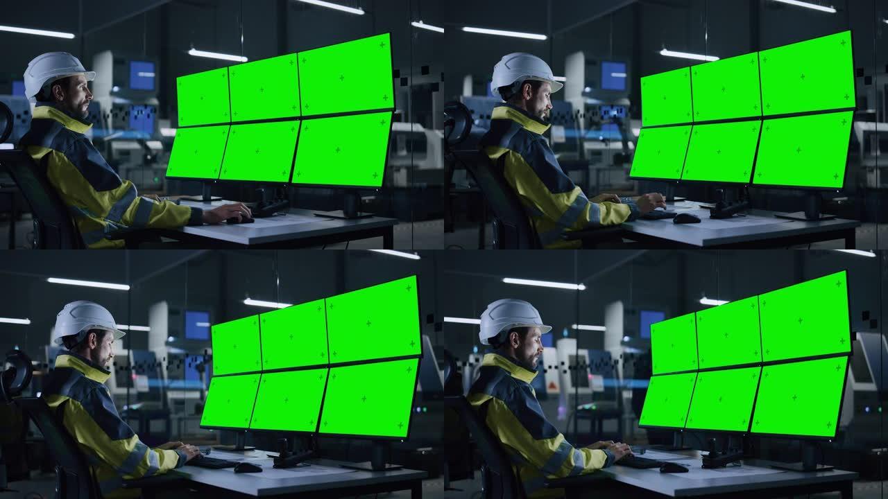工业4.0现代工厂: 英俊的男性操作员控制设施，使用具有多个色度键/绿屏显示的计算机。背景黑暗的自动