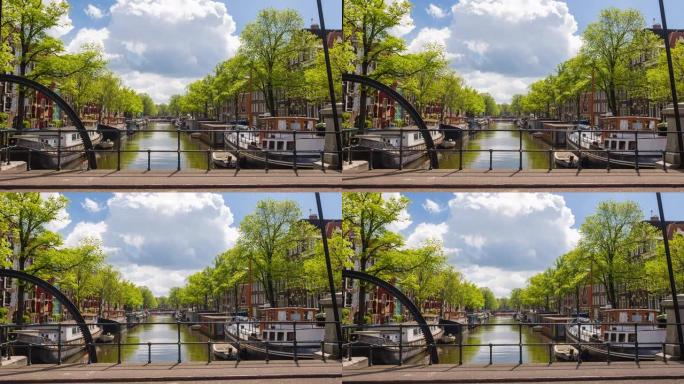 从阿姆斯特丹河运河的个人角度看，从桥上看到船只和船屋