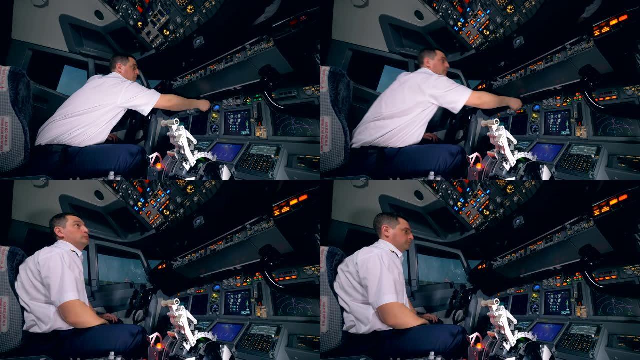 专业的aipane飞行员正在驾驶舱驾驶舱飞行甲板上转动指示器。