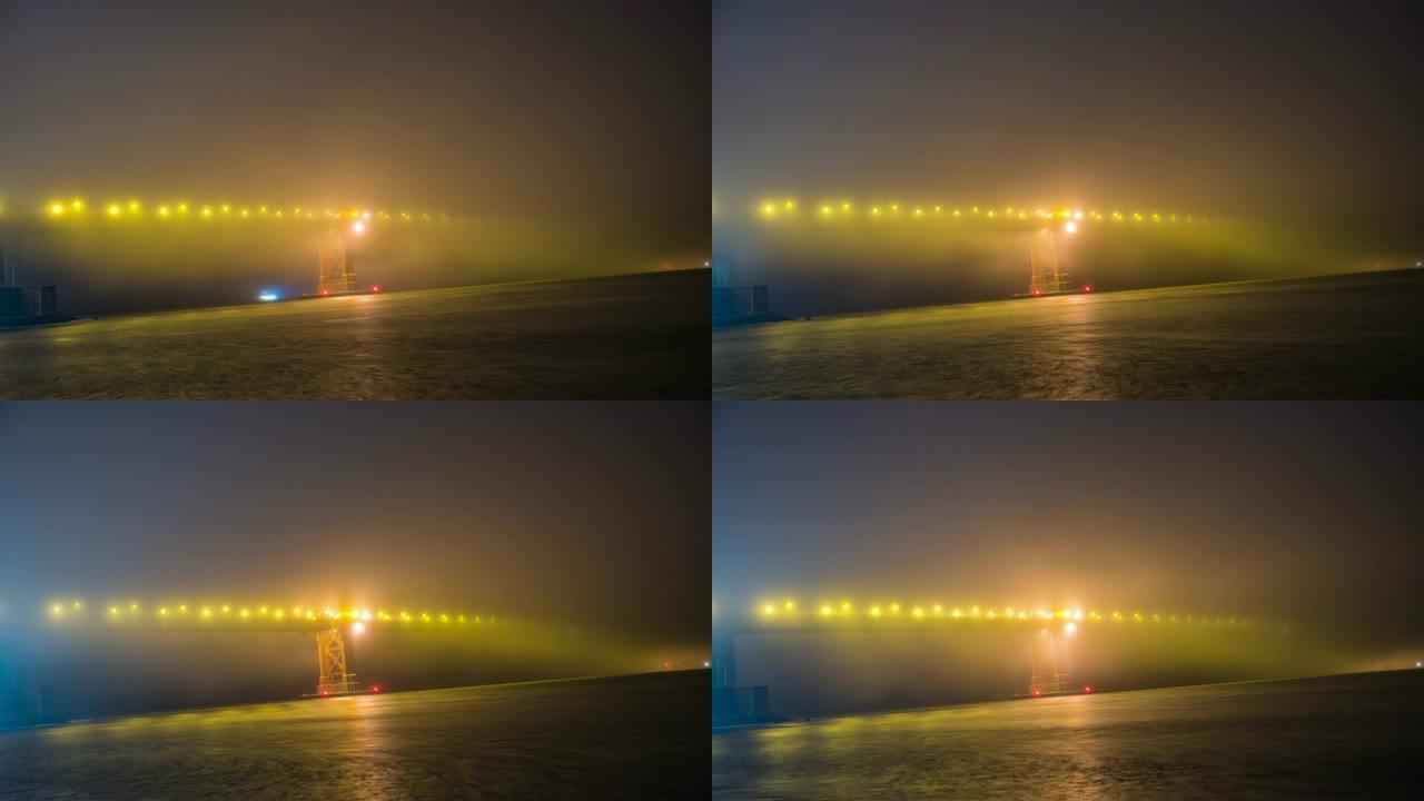美国夜间MS延时雾覆盖照明桥梁和河流