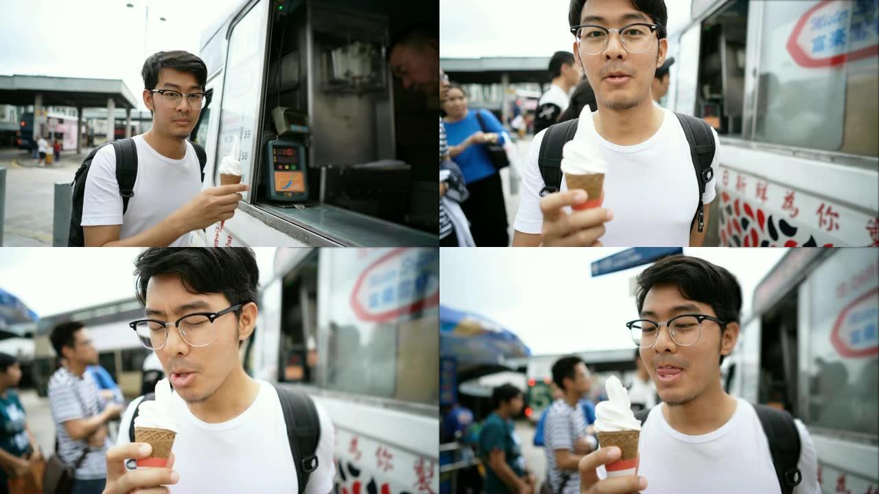 亚洲人从香港街头食品卡车上购买和食用冰激丸