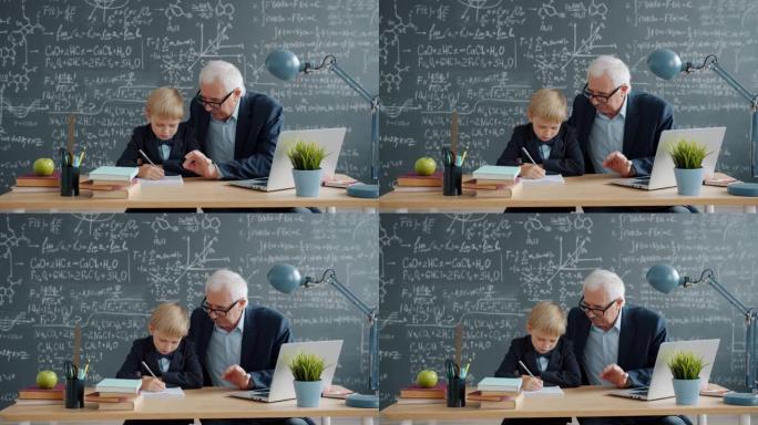 教授关心祖父在课堂上教小男孩孙子说话写作