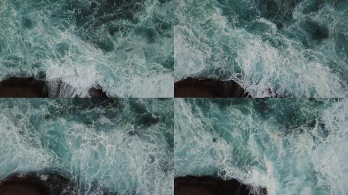 海浪撞击岩石的高角度视图