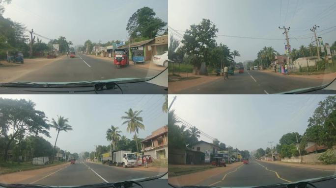 斯里兰卡sunny road上的MS汽车，人力车和自行车
