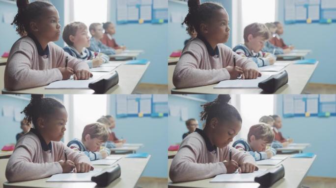 在小学教室里，聪明的黑人女孩在练习笔记本上写字，参加考试。初中教室里有各种各样聪明的孩子，勤奋学习。