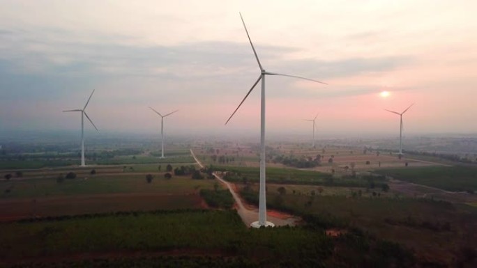 风力涡轮机替代能源的空中拍摄，日落早晨