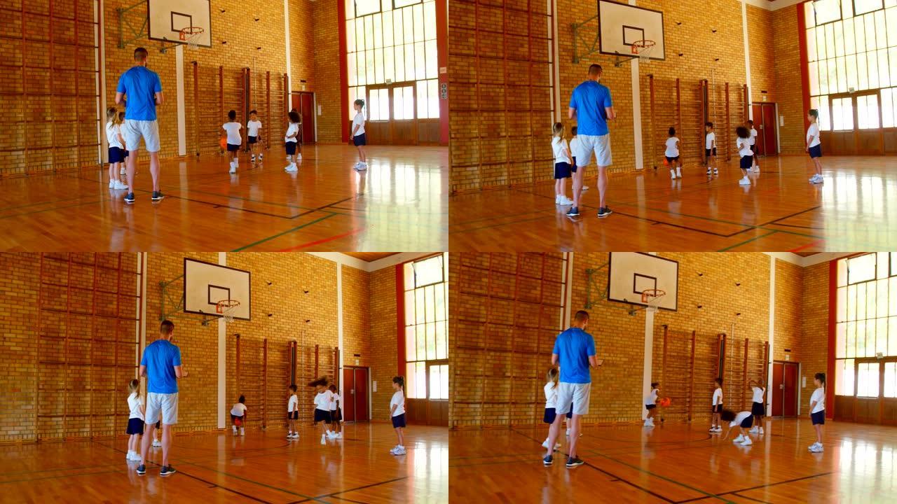 篮球教练在篮球场4k向学童教授篮球