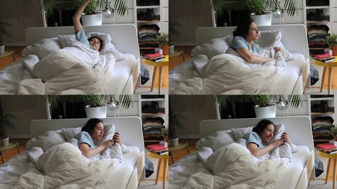 女人从床上醒来后发短信